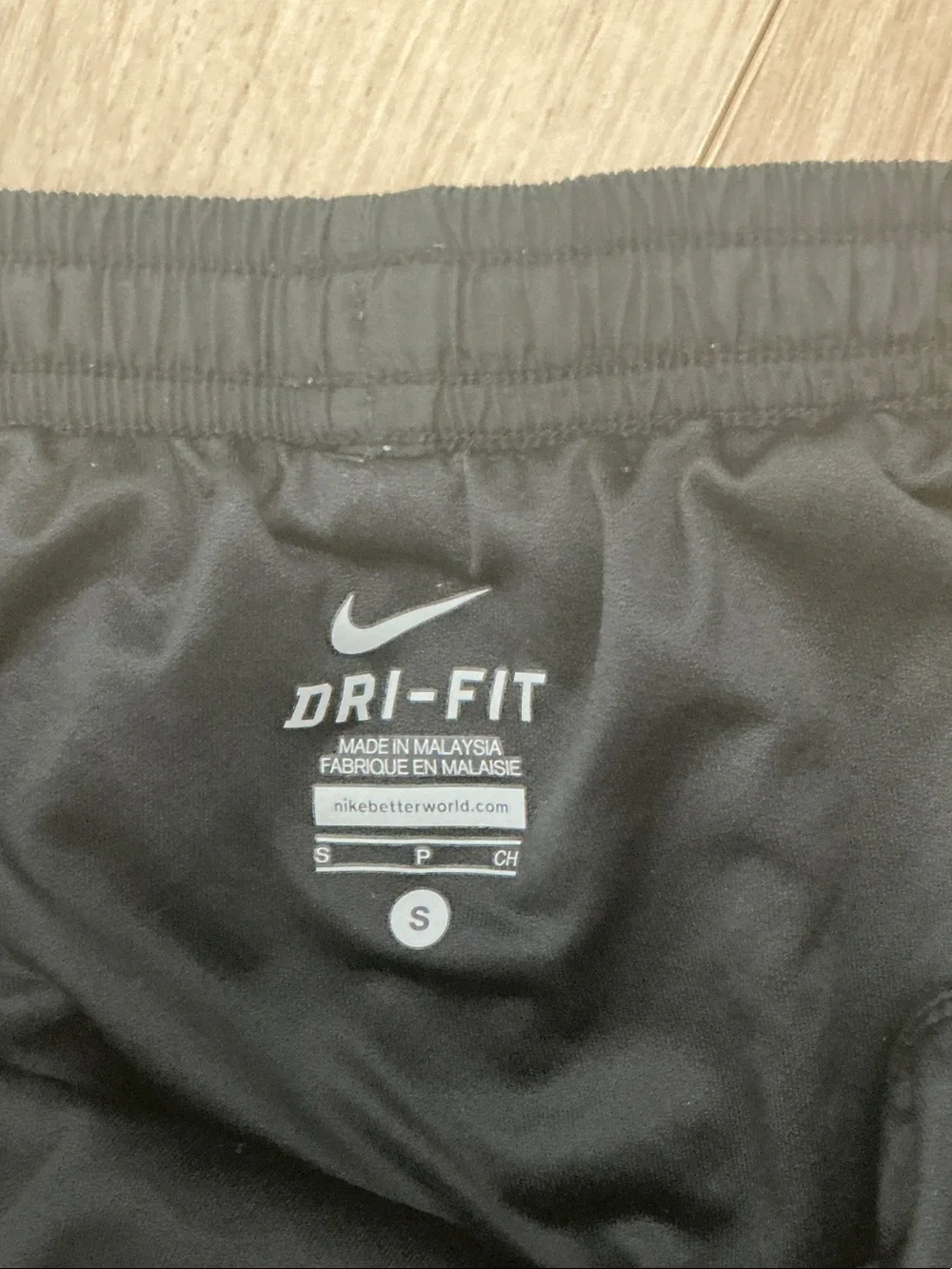 Nike Black Athletic Shorts with White Piping